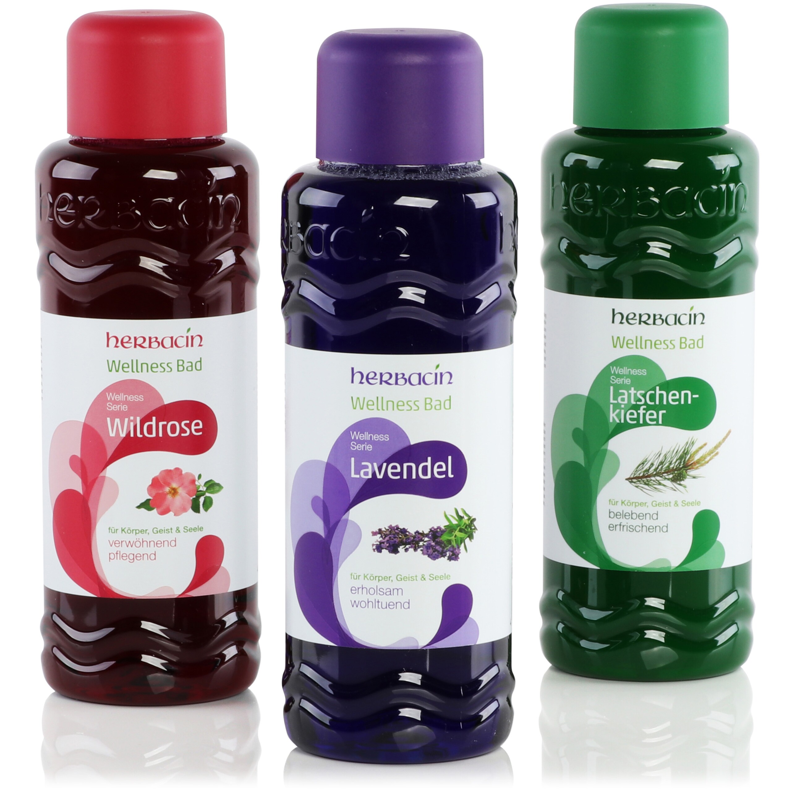 Drei Flaschen Wellness-Bad mit rot, violett und grün bedruckten Dekorationsetiketten der Marke Herbacin.
